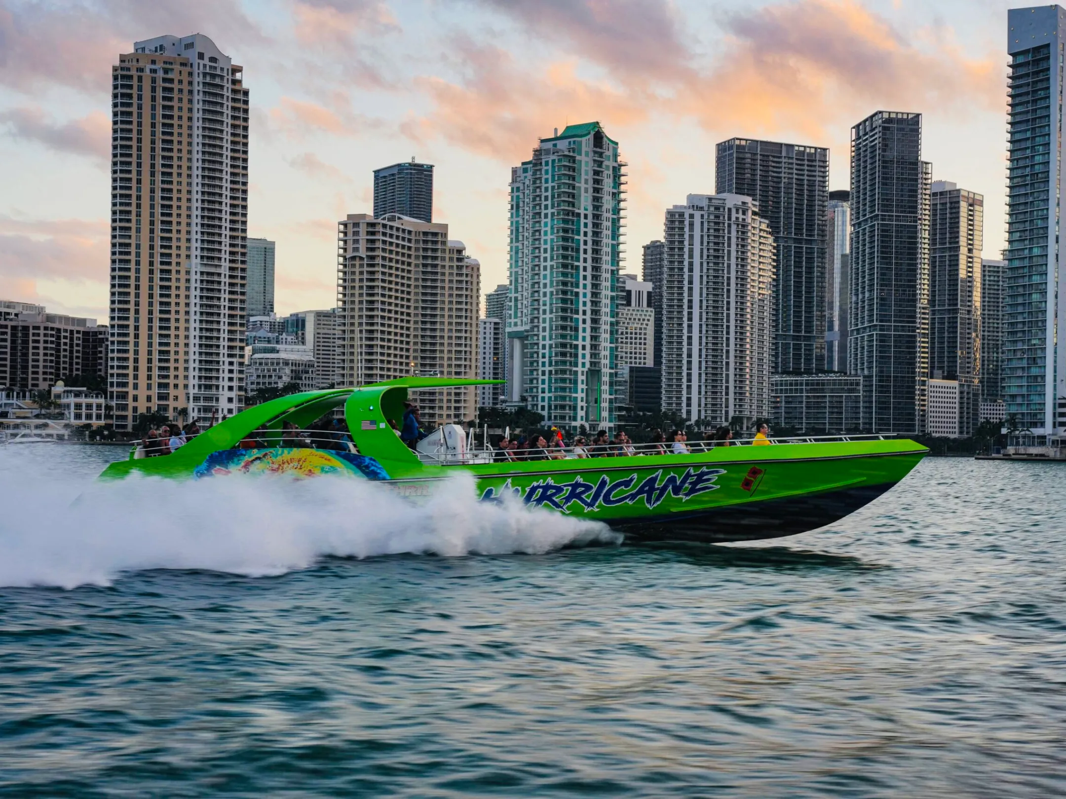 a large body of water with a city in the background