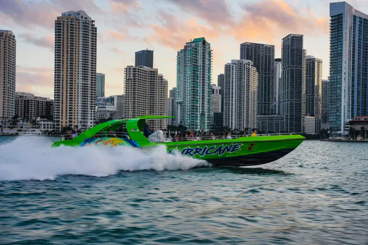 a large body of water with a city in the background
