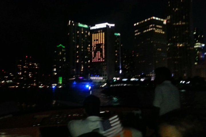 a close up of a busy city street at night